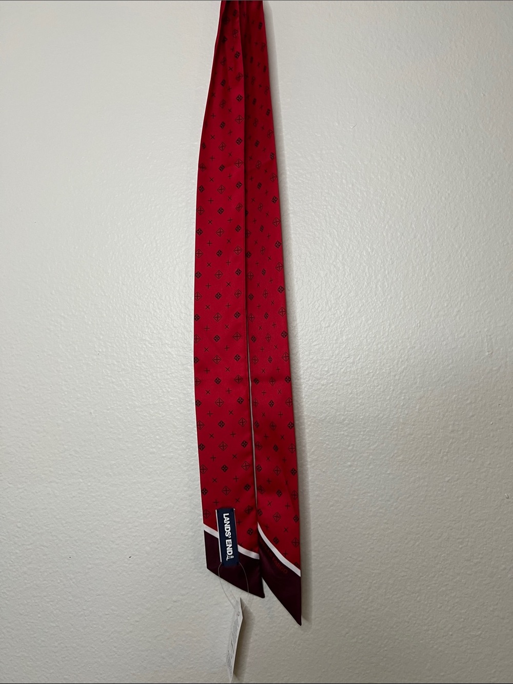 Lands' End Red Silk Tie with Small Black Motifonly thing it has Wells Fargo Logo